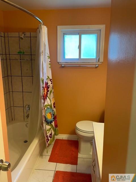 5 Bowser Road New Brunswick, NJ 08901 - Photo 30 of 45 a bathroom with a toilet and a shower
