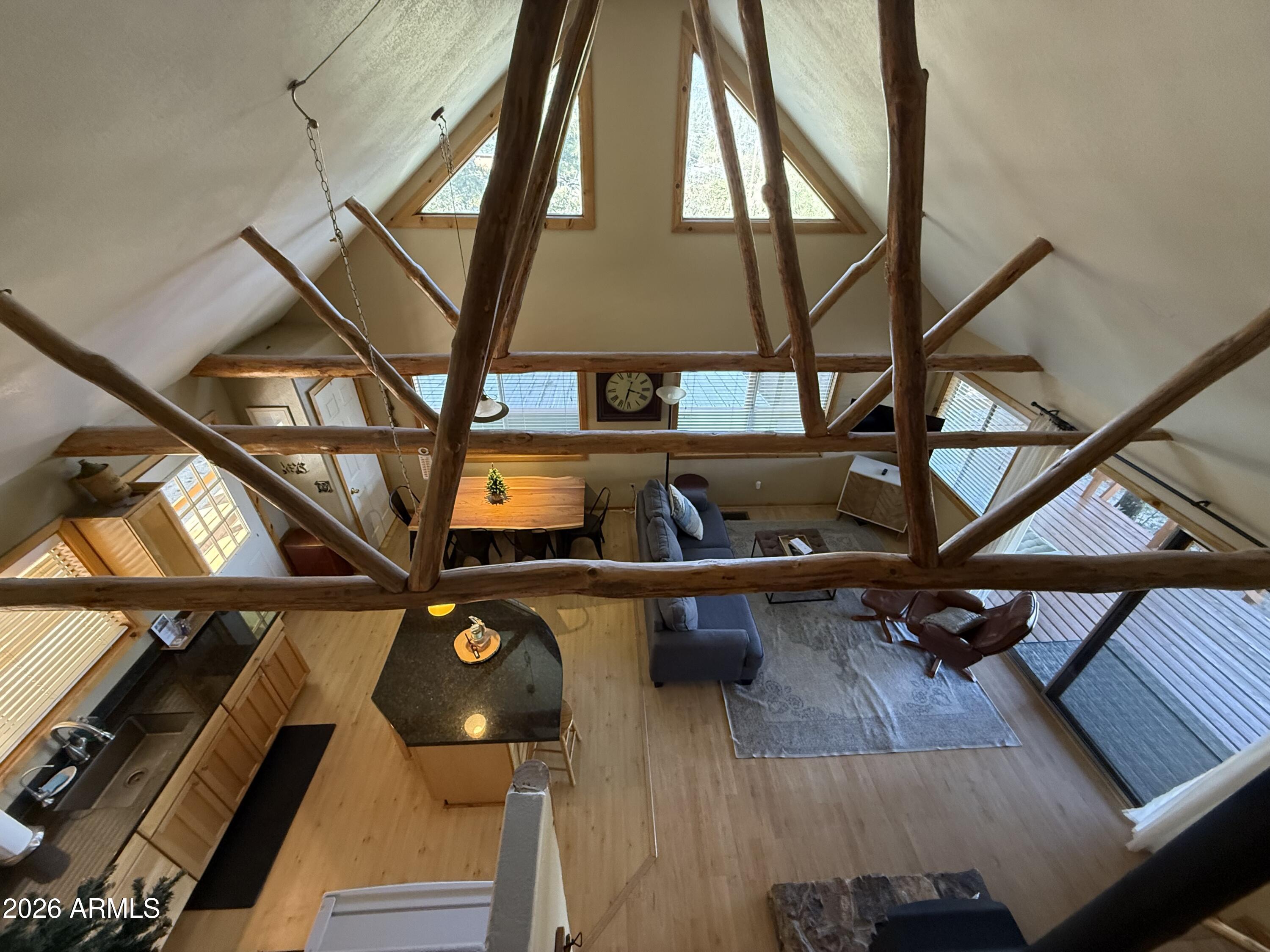 23487 Manzanita Road Crown King, AZ 86343 - Photo 15 of 41 a living room with furniture and wooden floor