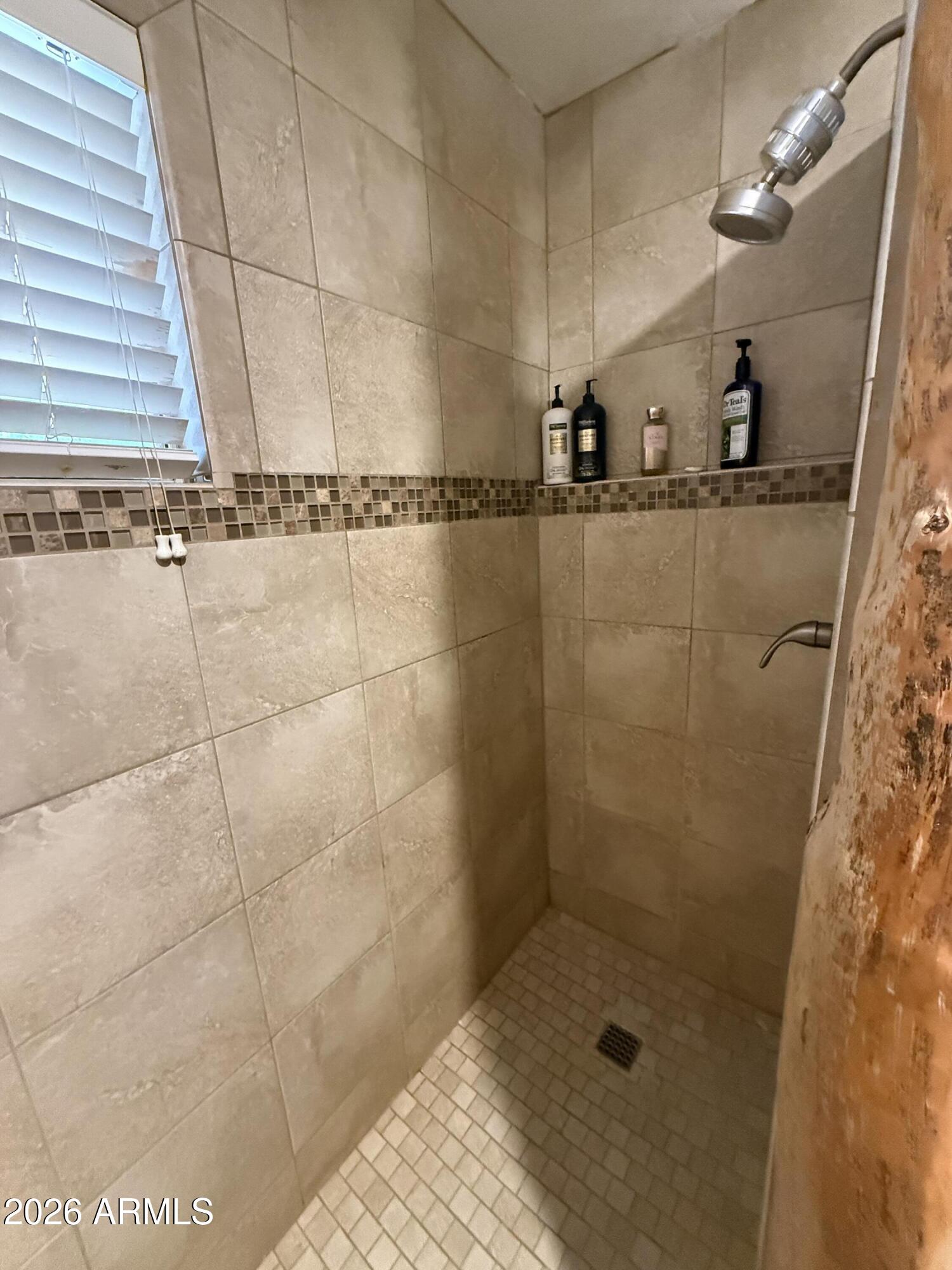 23487 Manzanita Road Crown King, AZ 86343 - Photo 36 of 45 a bathroom with a shower