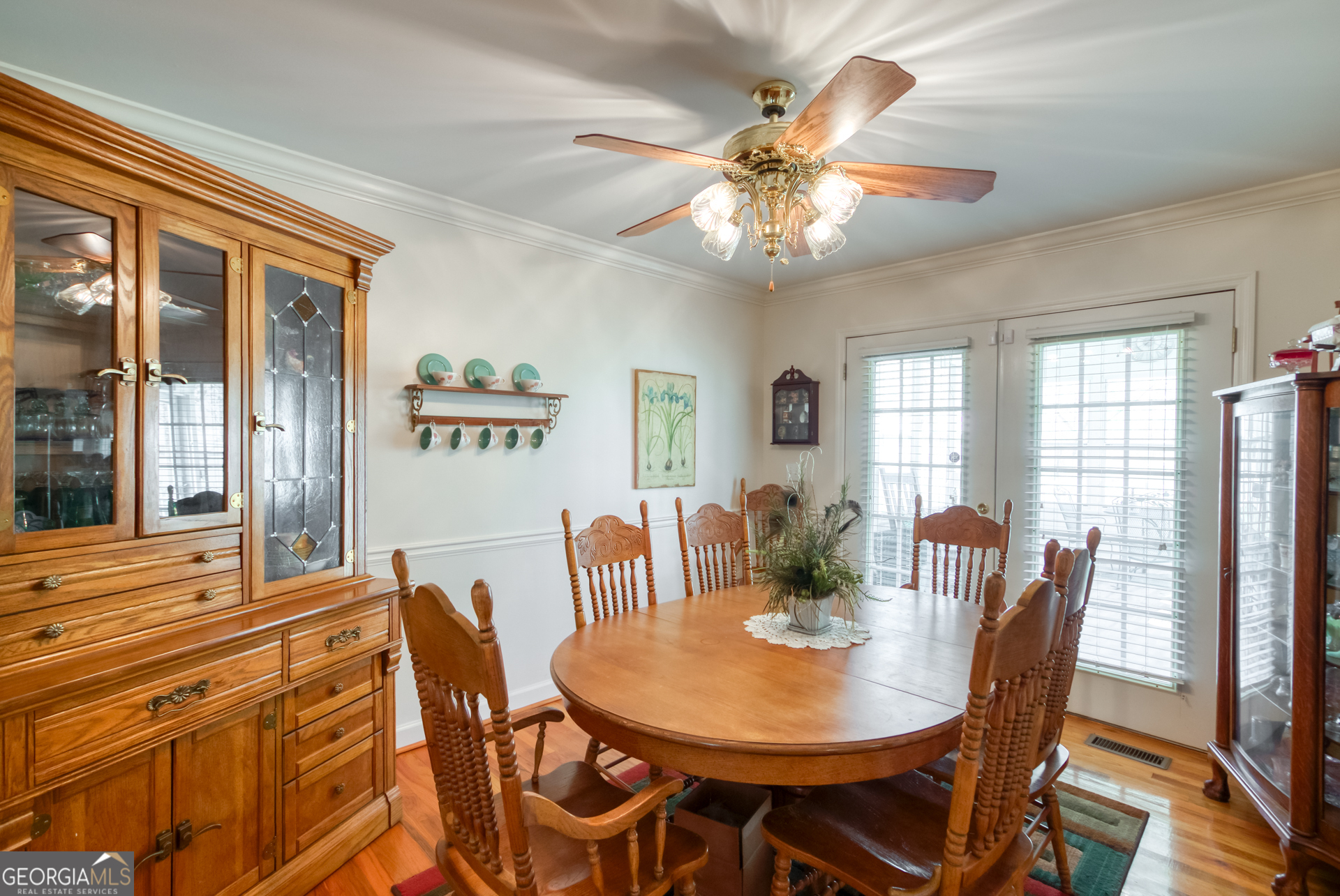 1650 Pierce Dairy Road Madison, GA 30650 - Photo 12 of 85 a view of a dining room with furniture window and wooden floor