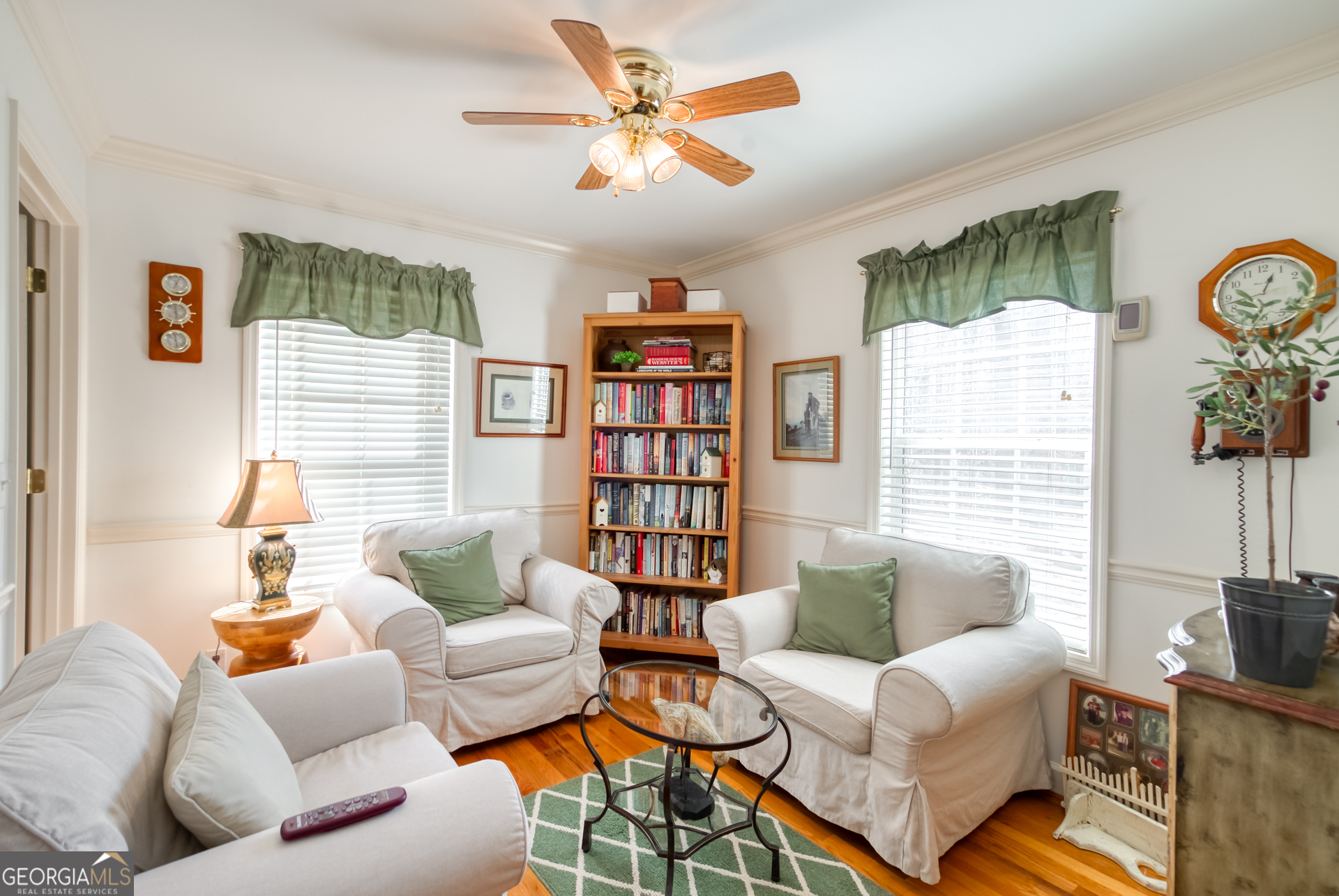 1650 Pierce Dairy Road Madison, GA 30650 - Photo 14 of 85 a living room with furniture and a large window