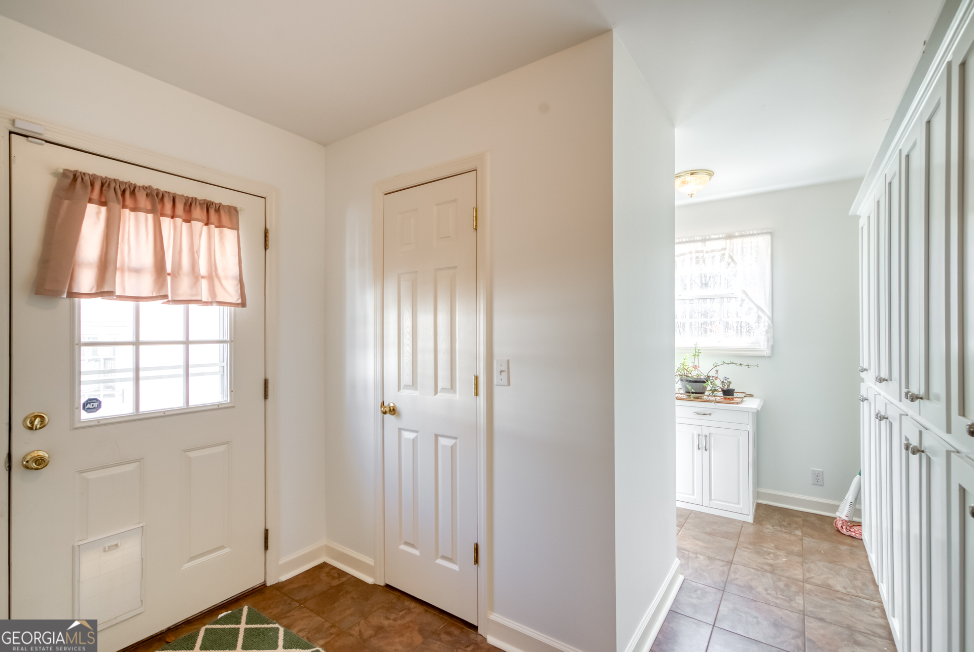 1650 Pierce Dairy Road Madison, GA 30650 - Photo 15 of 85 a view of an empty room with a window