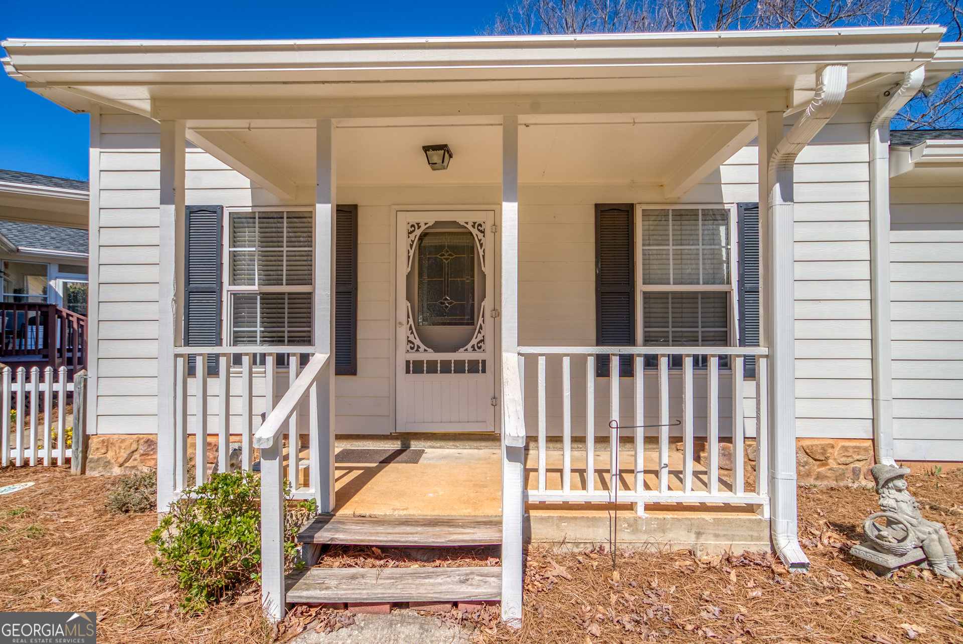 1650 Pierce Dairy Road Madison, GA 30650 - Photo 44 of 85 a view of a house with a small porch