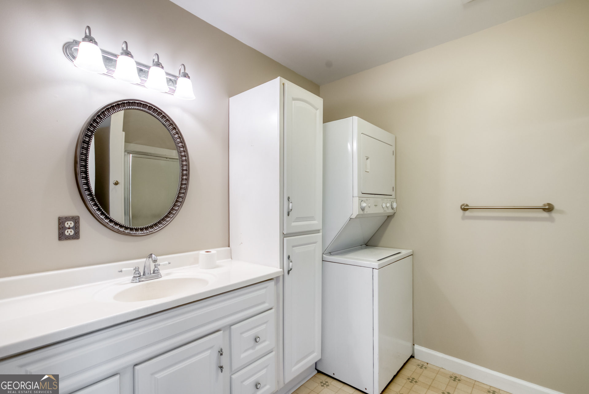 1650 Pierce Dairy Road Madison, GA 30650 - Photo 49 of 85 a bathroom with a sink and a mirror
