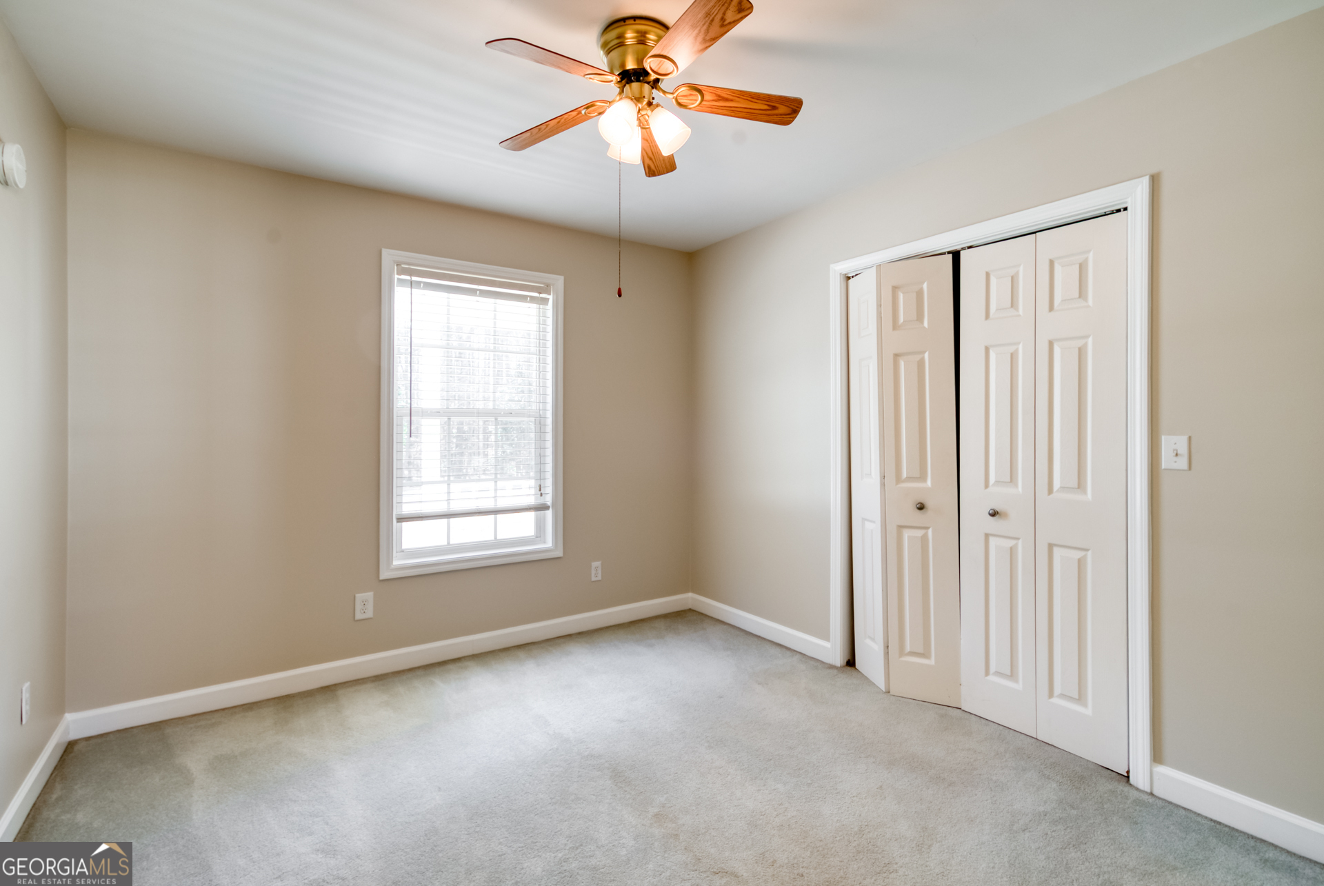 1650 Pierce Dairy Road Madison, GA 30650 - Photo 52 of 85 a view of a room with window and ceiling fan