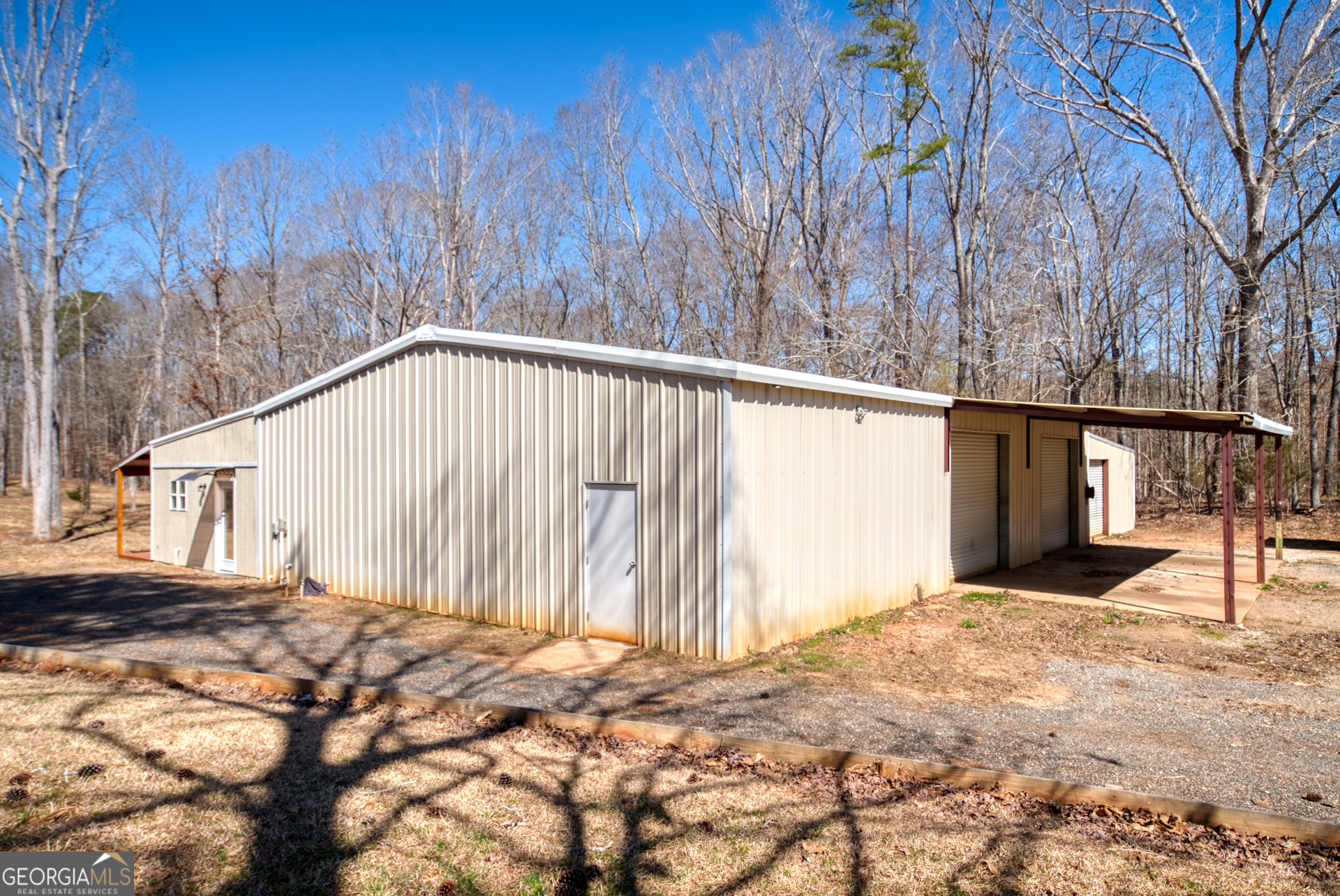 1650 Pierce Dairy Road Madison, GA 30650 - Photo 55 of 85 a view of a backyard of the house
