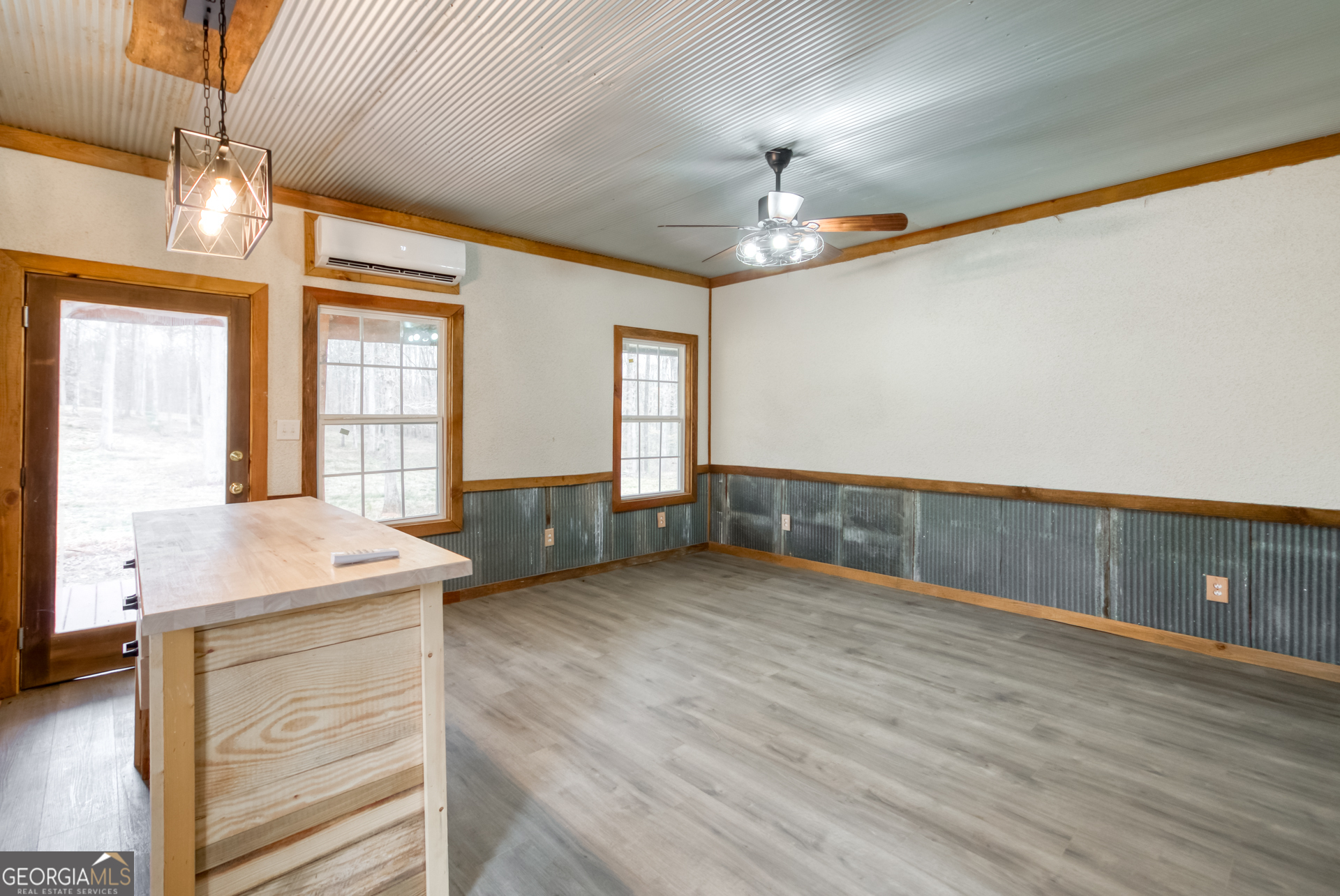1650 Pierce Dairy Road Madison, GA 30650 - Photo 66 of 85 a view of an empty room with a window