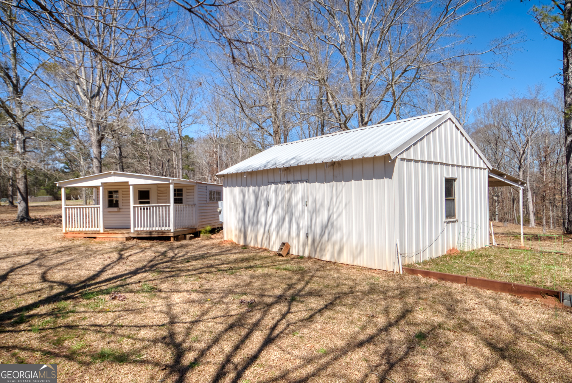 1650 Pierce Dairy Road Madison, GA 30650 - Photo 73 of 85 a front view of a house with a yard