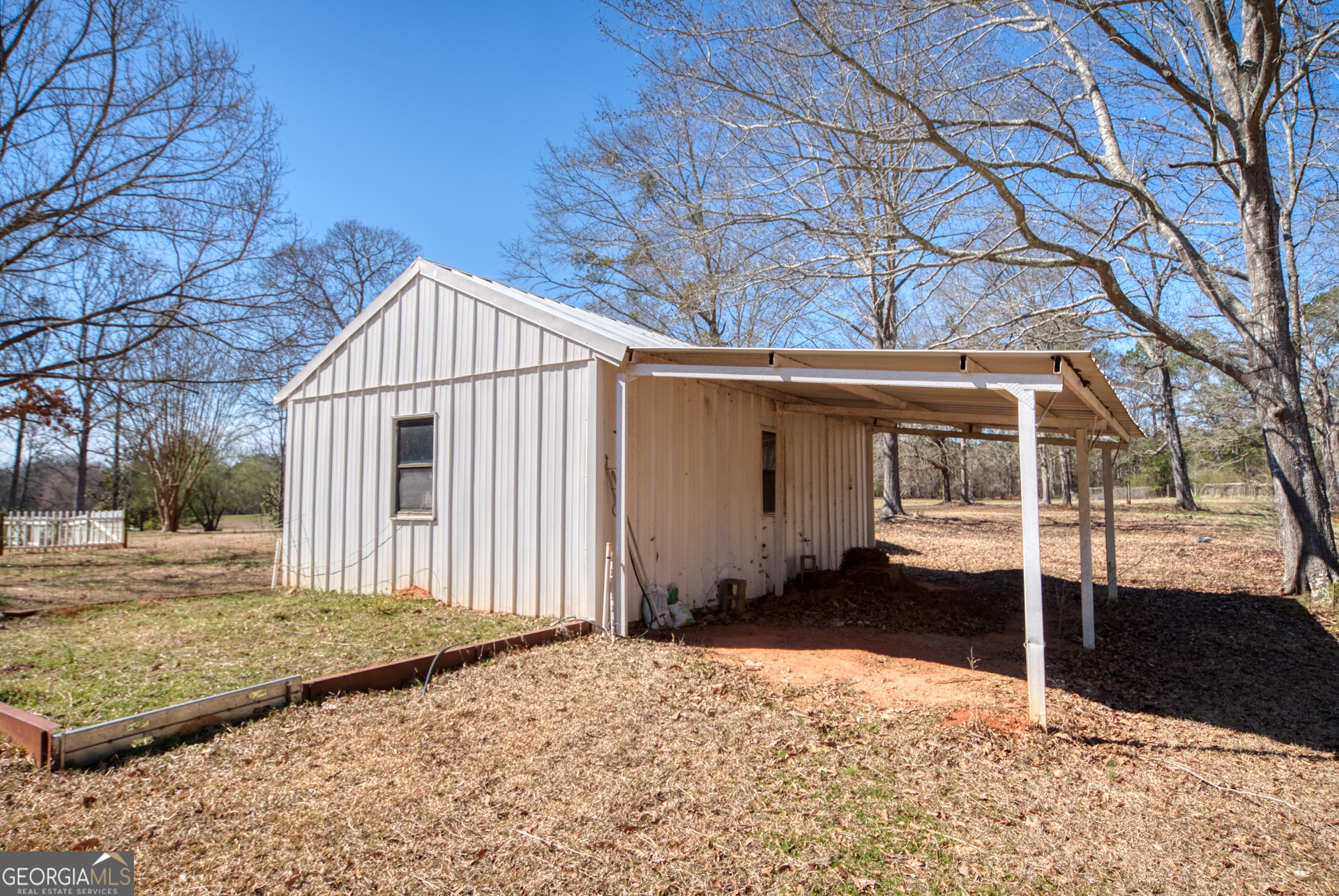 1650 Pierce Dairy Road Madison, GA 30650 - Photo 74 of 85 a view of a house with a yard
