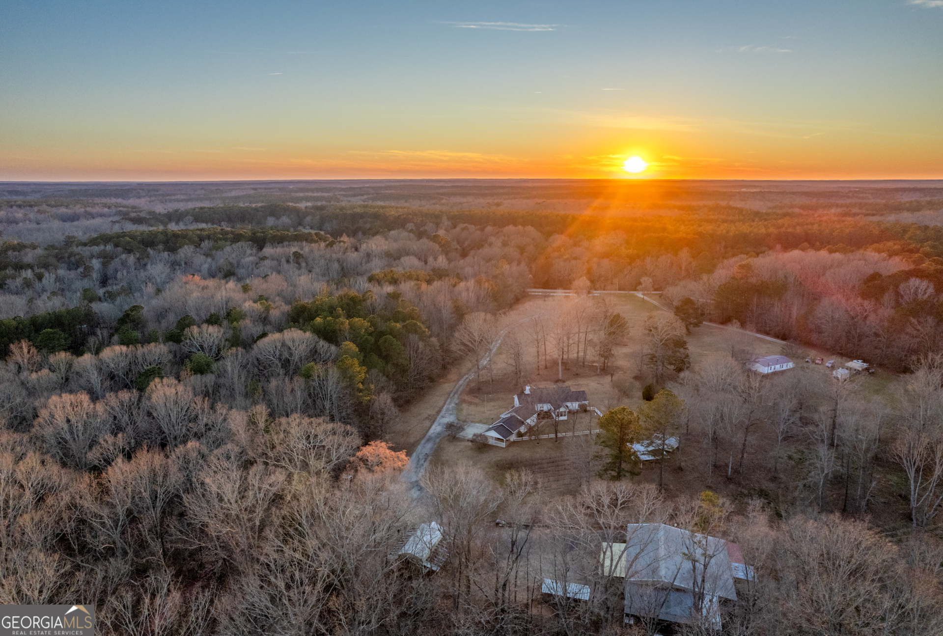 1650 Pierce Dairy Road Madison, GA 30650 - Photo 79 of 85 an aerial view of residential houses with outdoor space