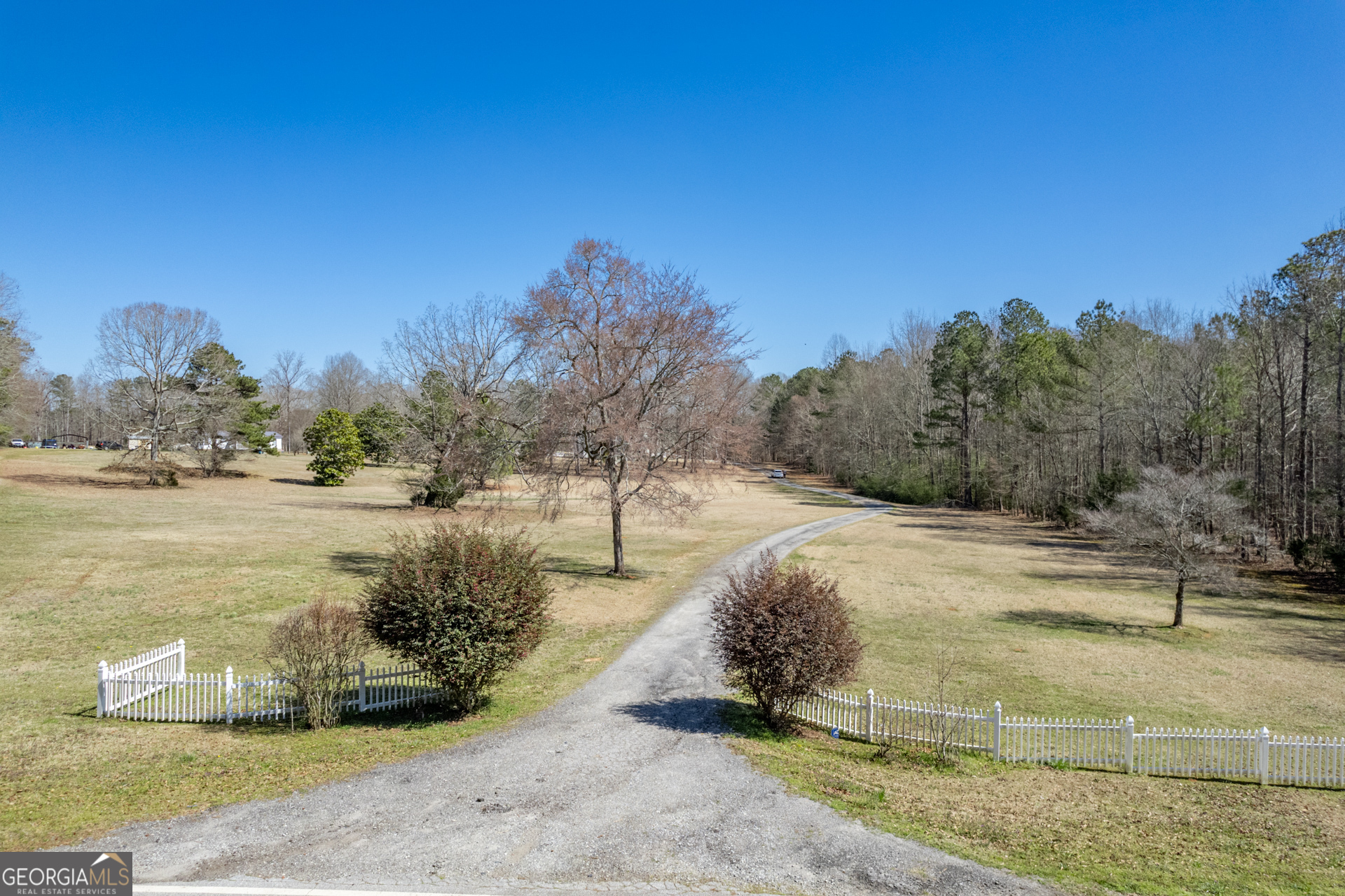 1650 Pierce Dairy Road Madison, GA 30650 - Photo 84 of 85 a view of a yard with an outdoor space