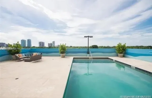 a view of a lake with a big yard