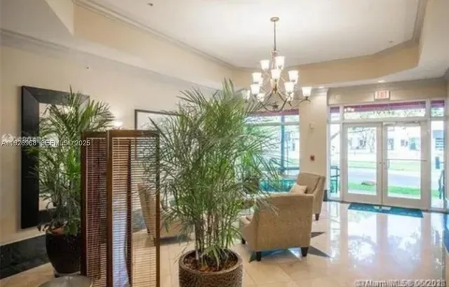 a room with furniture and a chandelier