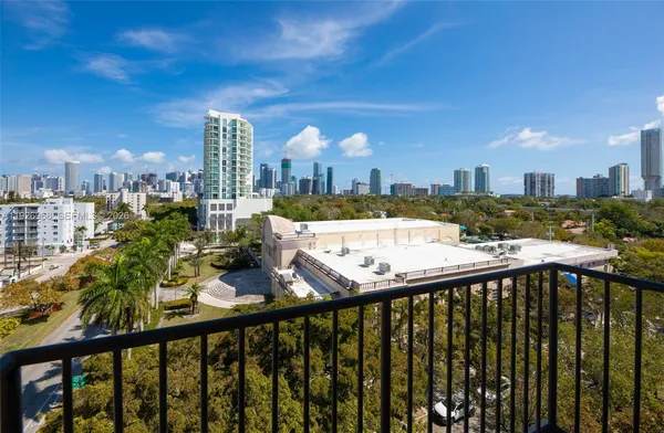 a view of a balcony with city view