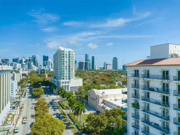 a view of a city with tall buildings