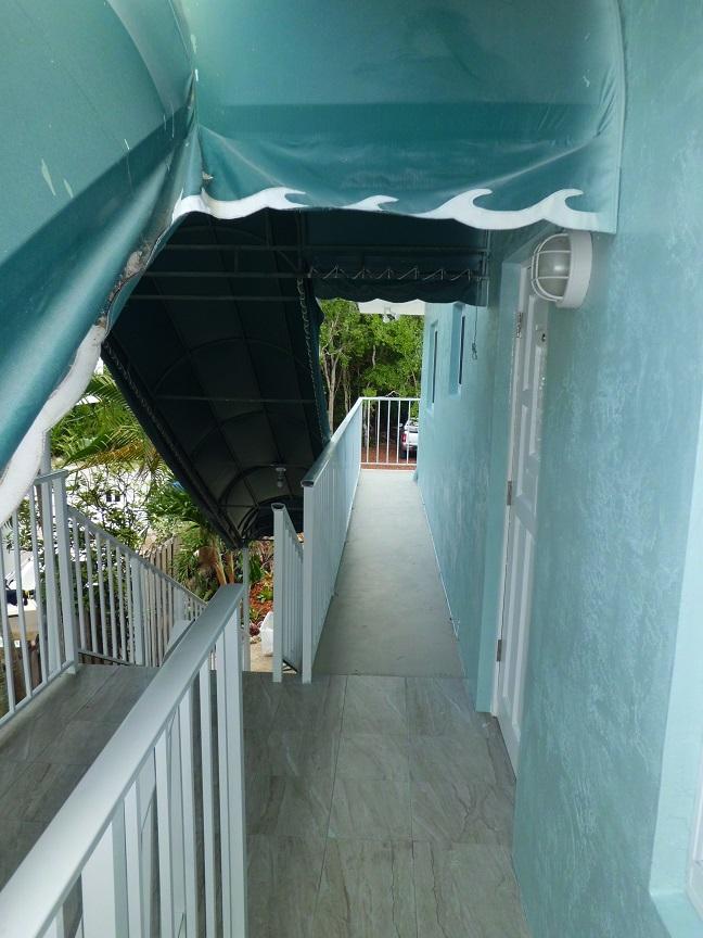 16 Bahama Road Key Largo, FL 33037 - Photo 14 of 39 BAH 2ND WALKWAY