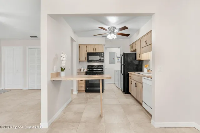a view of workspace with wooden floor