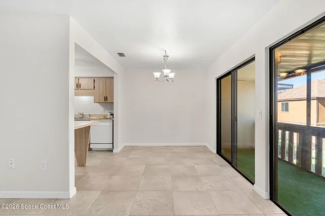 a view of a porch with wooden floor