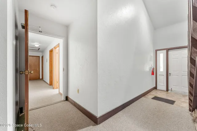a group of people sitting in a living room