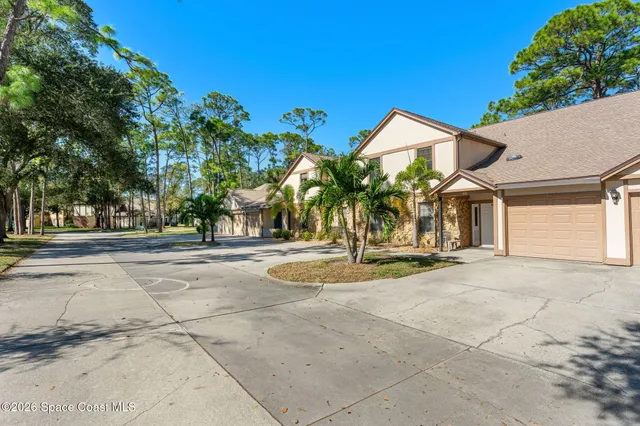 a view of a livingroom with workspace and a couch