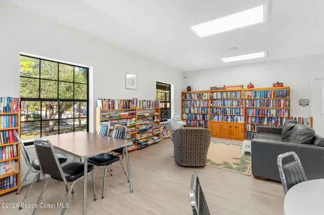 a kitchen with a sink a stove and refrigerator