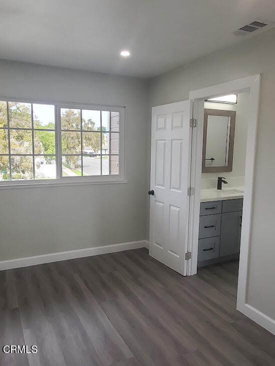 410 Bluebell Place Oxnard, CA 93036 - Photo 12 of 20 wooden floor in an empty room with a window and wooden floor