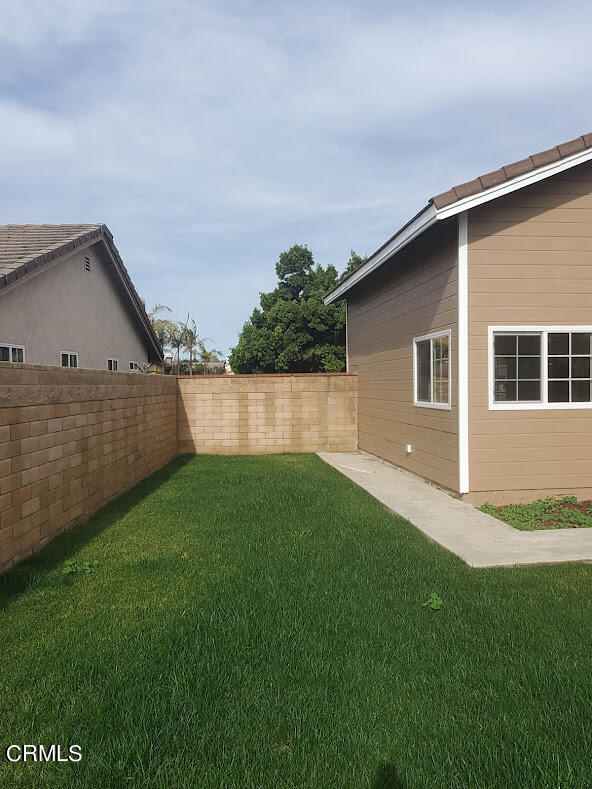 410 Bluebell Place Oxnard, CA 93036 - Photo 20 of 20 a view of an house with backyard and garden