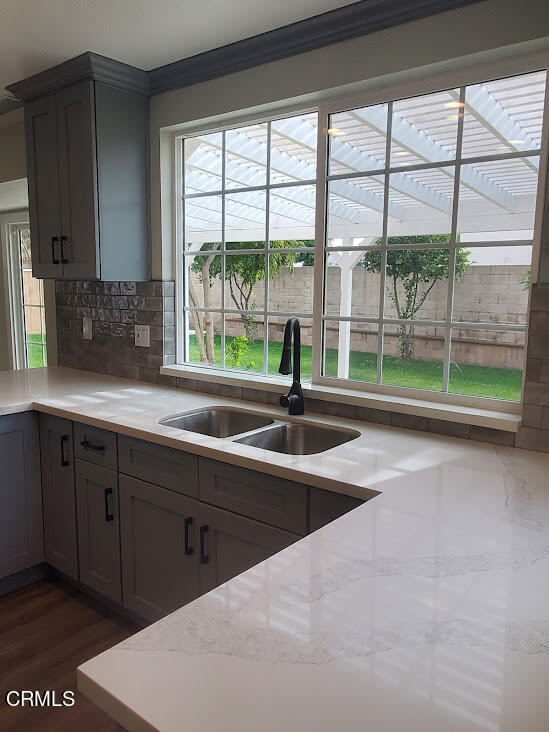 410 Bluebell Place Oxnard, CA 93036 - Photo 6 of 20 a spacious bathroom with a large window and sink