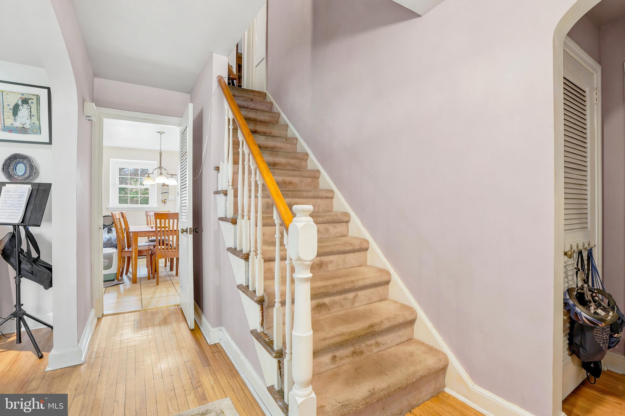 284 Trent Road Wynnewood, PA 19096 - Photo 2 of 31 a view of a hallway with wooden floor and staircase
