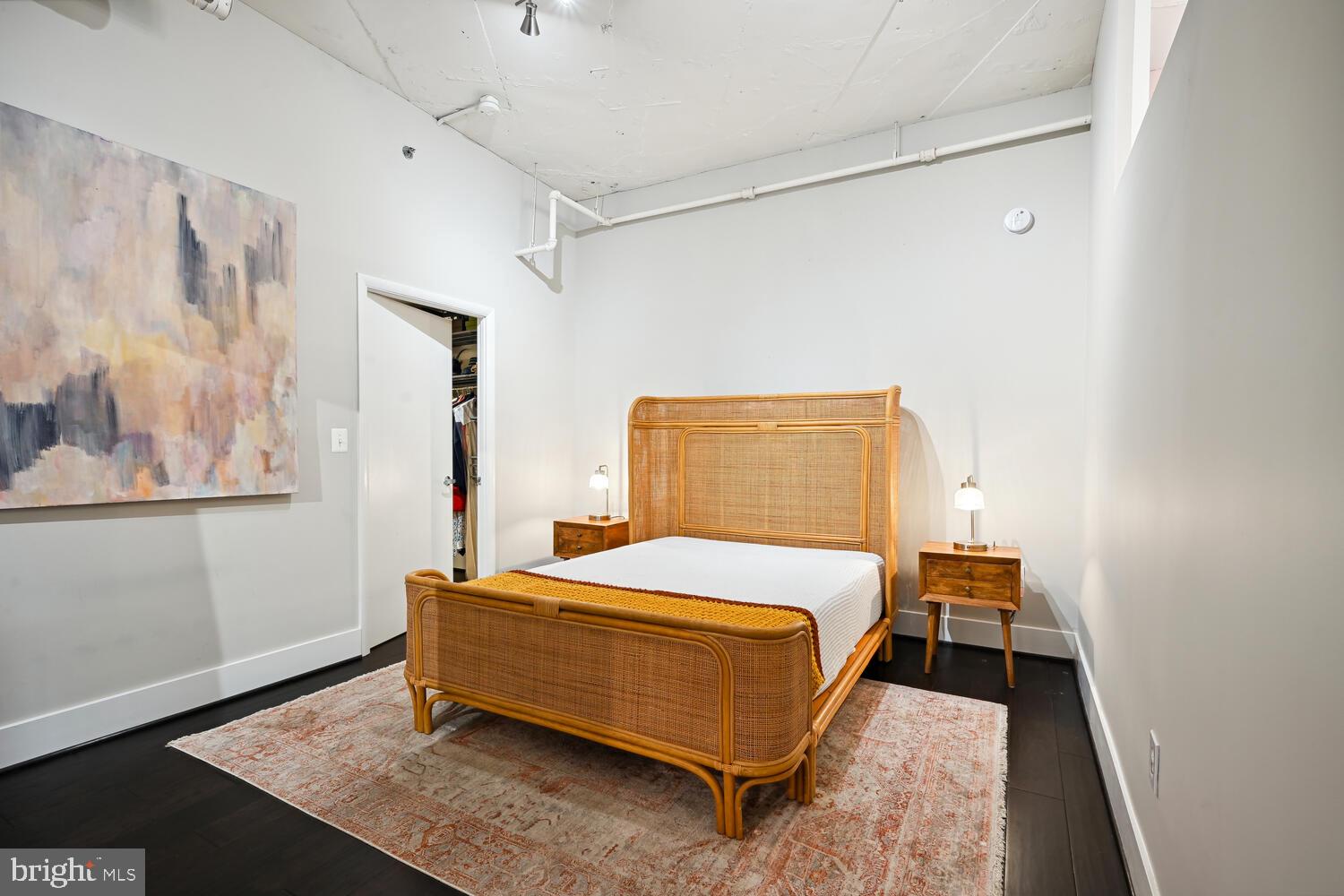 1700 Kalorama Road Northwest, Unit 207 Washington, DC 20009 - Photo 12 of 27 a bedroom with a bed and a window