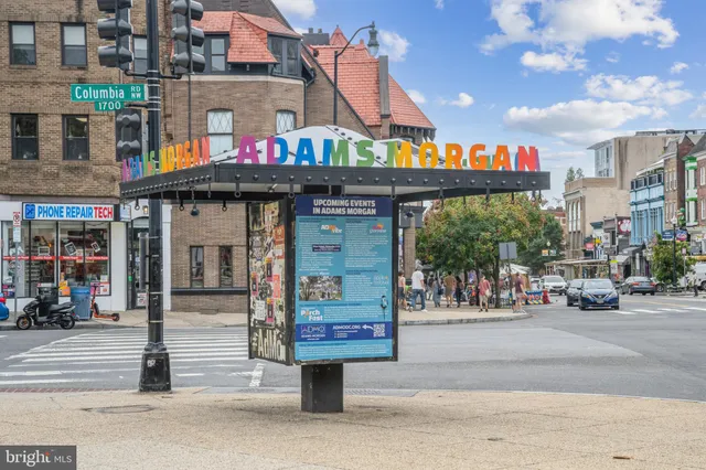 a view of street with shops