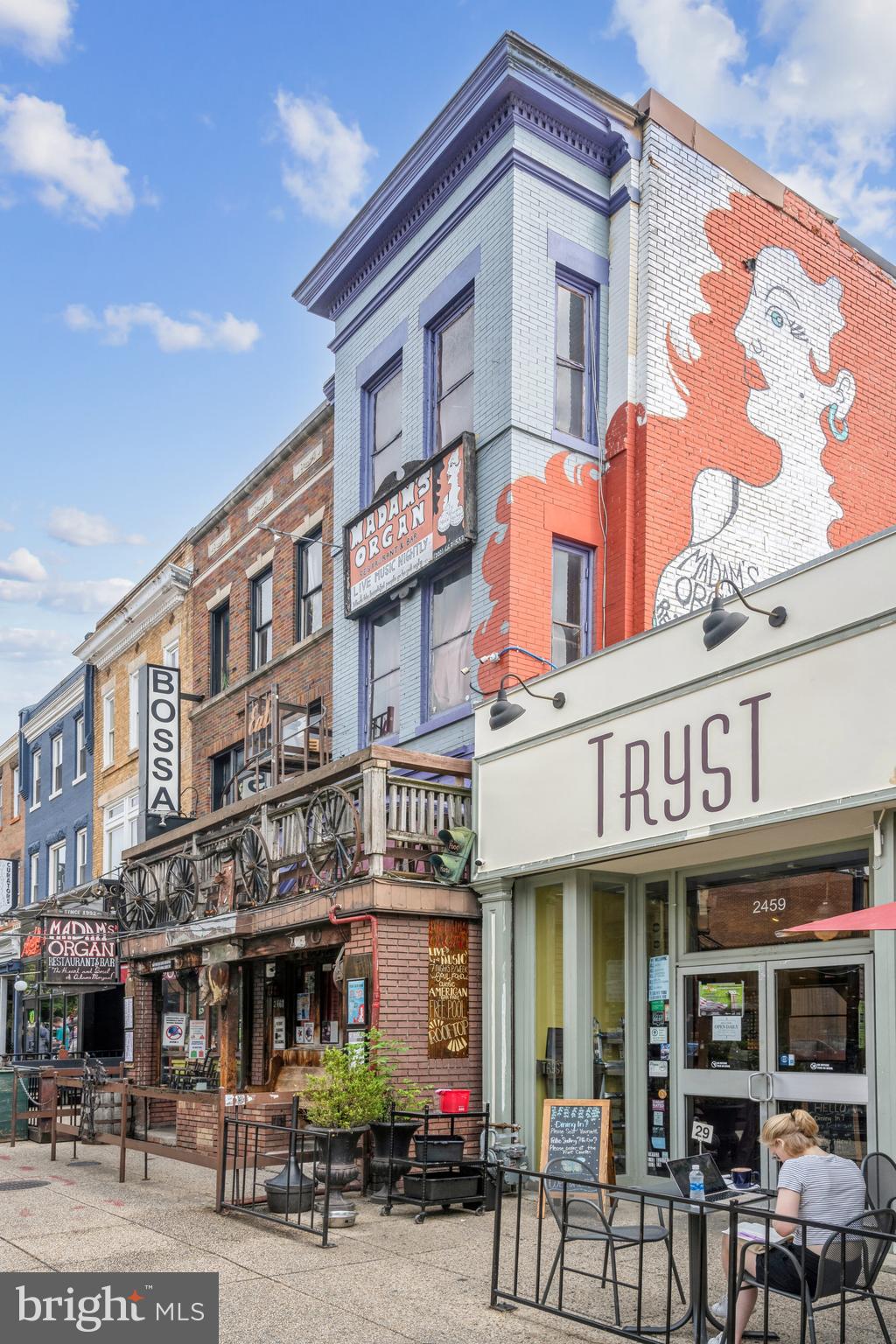 1700 Kalorama Road Northwest, Unit 207 Washington, DC 20009 - Photo 27 of 27 a view of street with shops