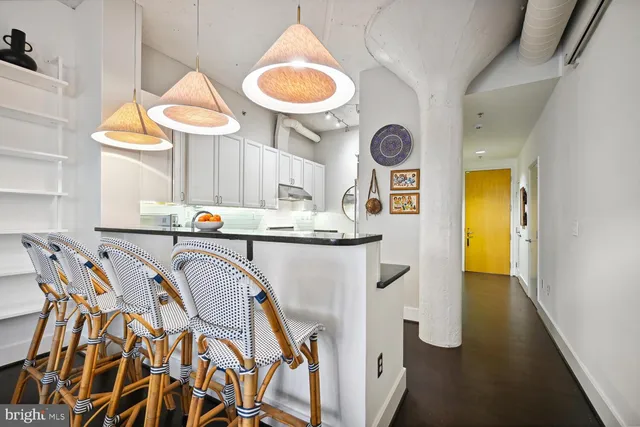 a kitchen with a sink and a stove