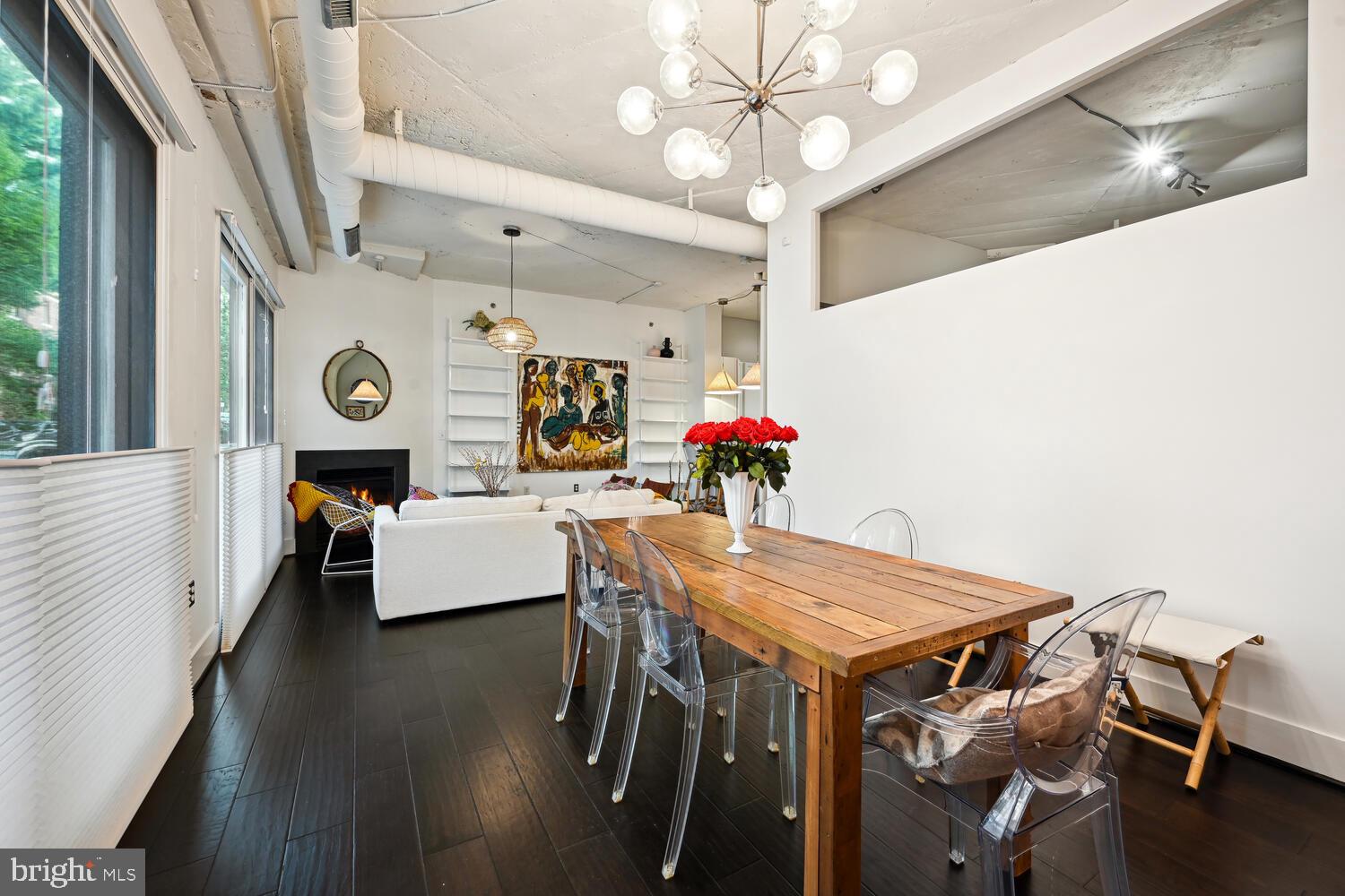 1700 Kalorama Road Northwest, Unit 207 Washington, DC 20009 - Photo 10 of 27 a view of a dining room with furniture and wooden floor