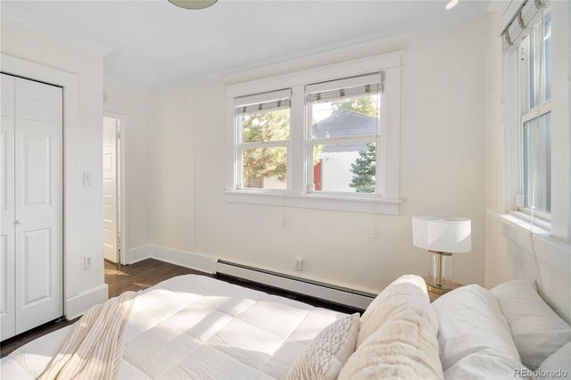 a bathroom with a sink a mirror and a toilet