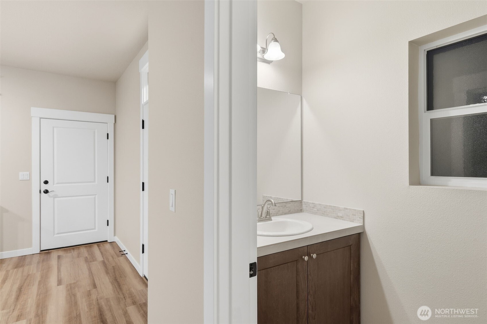 7110 South 13th Street Ridgefield, WA 98642 - Photo 11 of 28 a bathroom with a sink and a mirror