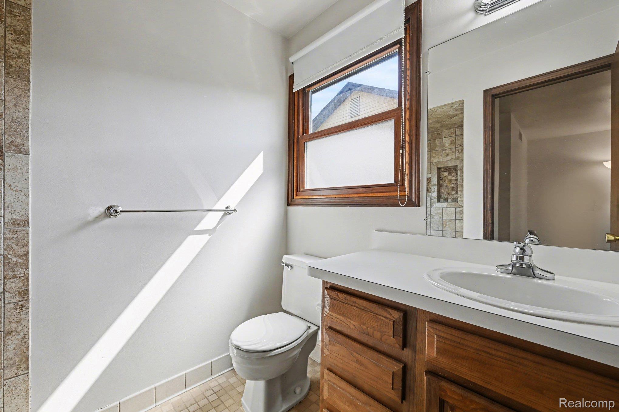 33593 Curtis Road Livonia, MI 48152 - Photo 18 of 30 Bathroom featuring vanity and toilet