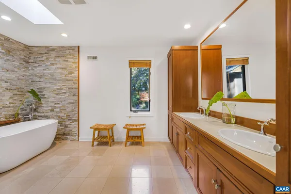 a bed room with a bed and a window