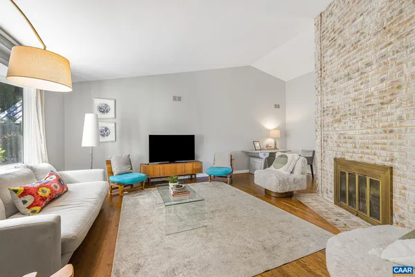 a front view of a house with a yard balcony