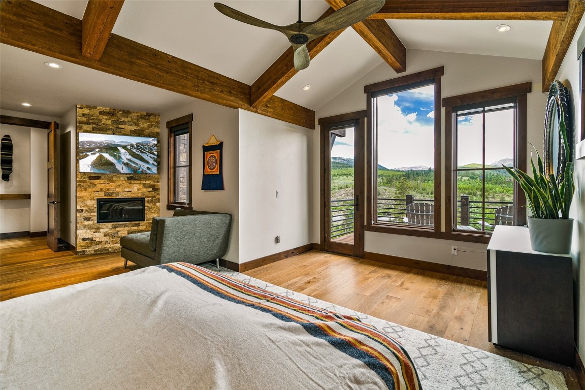 455 Highfield Trail Breckenridge, CO 80424 - Photo 16 of 50 a bedroom with a large bed and a large window