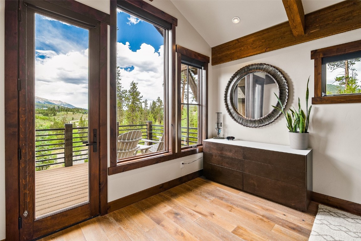 455 Highfield Trail Breckenridge, CO 80424 - Photo 17 of 50 a bathroom with a sink and a large mirror