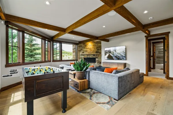 a living room with furniture and windows
