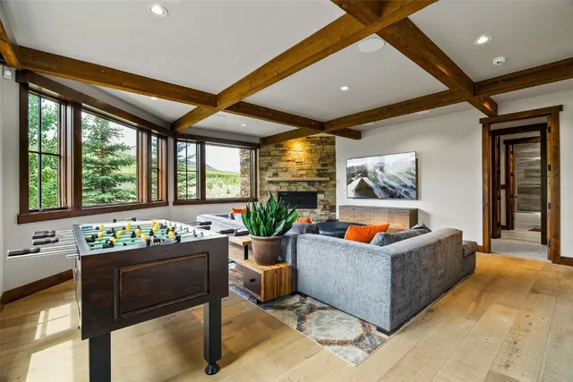 a living room with furniture and windows