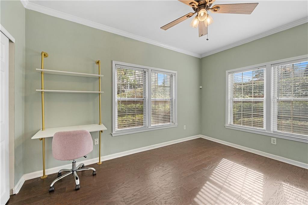 220 Renaissance Parkway Northeast, Unit 2119 Atlanta, GA 30308 - Photo 12 of 19 a view of a workspace with furniture and a window