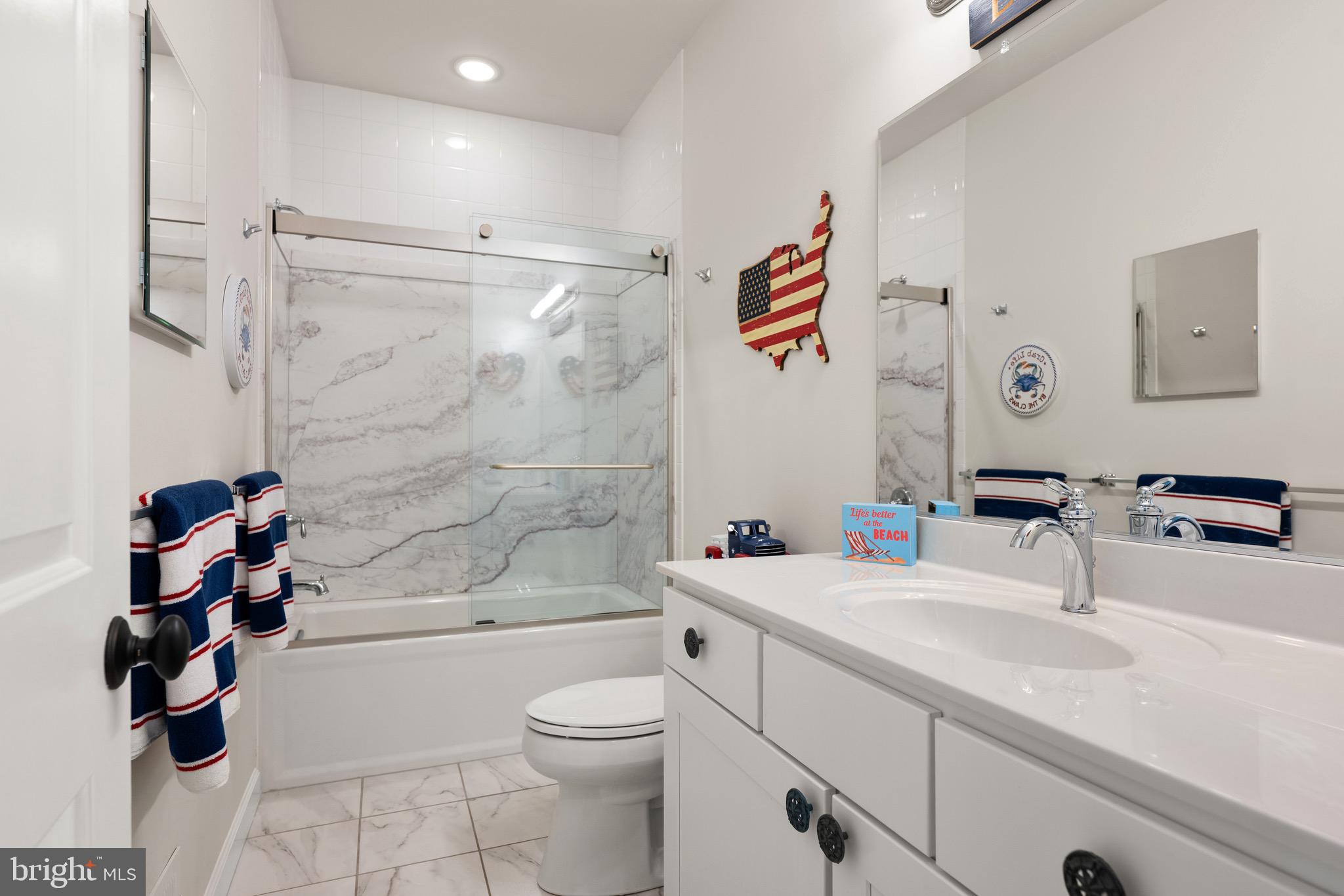 20382 Hopkins Road Lewes, DE 19958 - Photo 29 of 43 Guest Bth, Custom Tile, Shower Sleek w Glass Doors