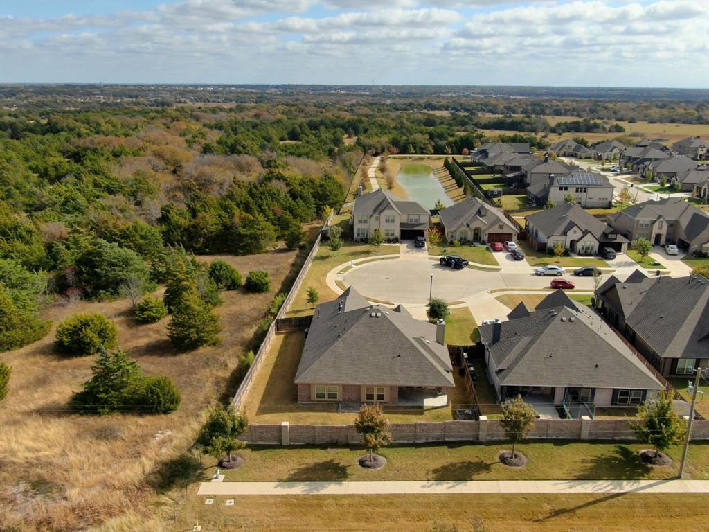 1913 Winter Lane Midlothian, TX 76065 - Photo 32 of 34 an aerial view of residential houses with outdoor space