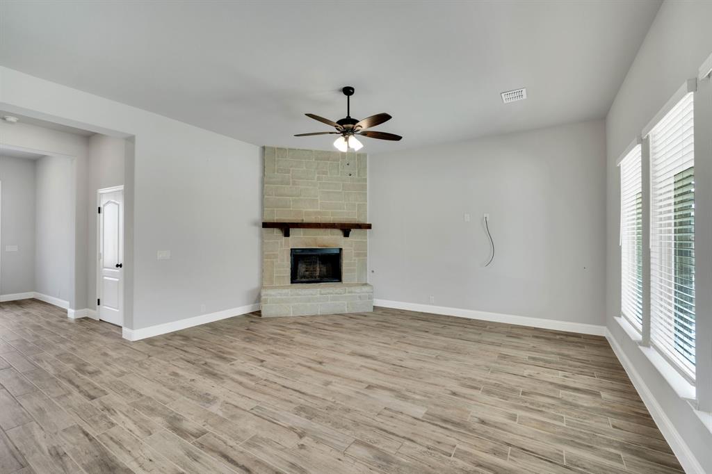 1913 Winter Lane Midlothian, TX 76065 - Photo 10 of 34 an empty room with fan and windows