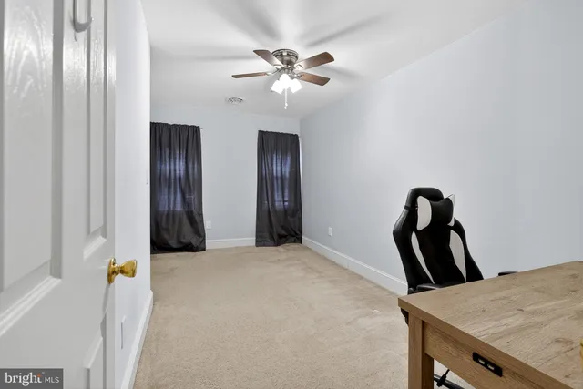 a view of a livingroom with a staircase