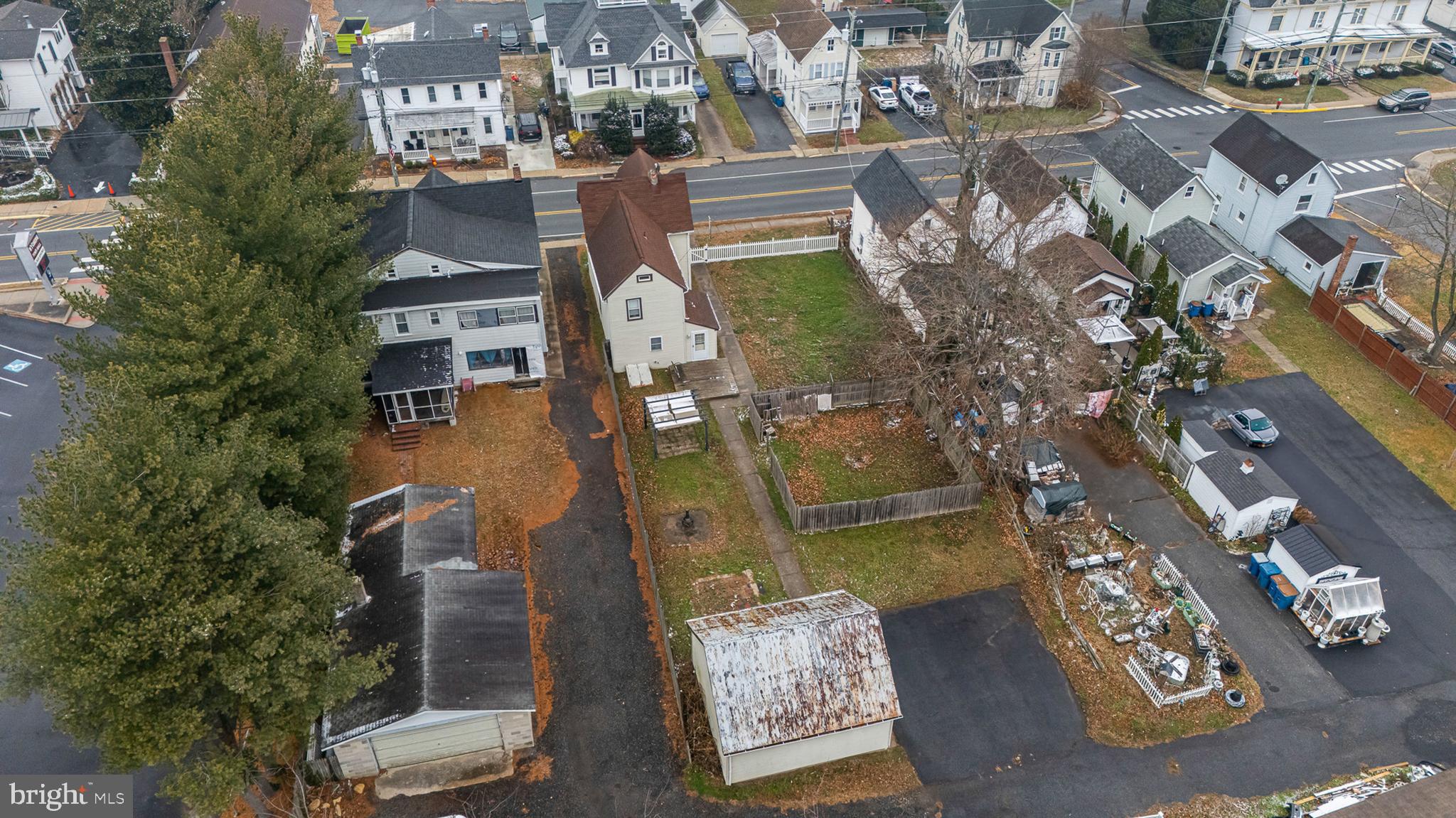 110 West Camden Wyoming Avenue Wyoming, DE 19934 - Photo 31 of 32 an aerial view of residential houses with outdoor space