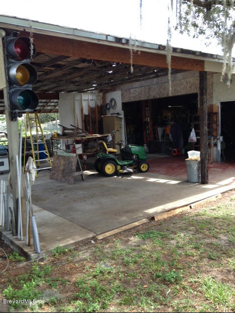922 Clearlake Road Cocoa, FL 32922 - Photo 11 of 31 a view of a bike garage